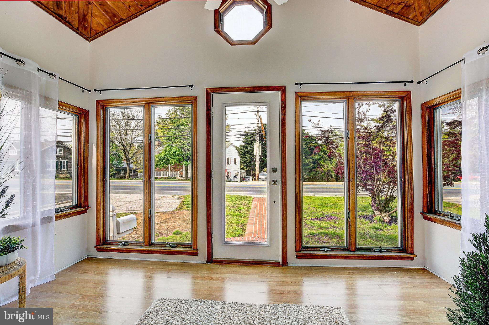107 North Hammonds Ferry Road Linthicum Heights, MD 21090 - Photo 3 of 43 Inviting sunroom