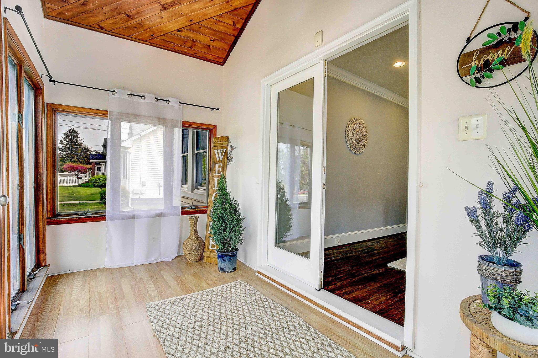 107 North Hammonds Ferry Road Linthicum Heights, MD 21090 - Photo 4 of 43 Inviting sunroom