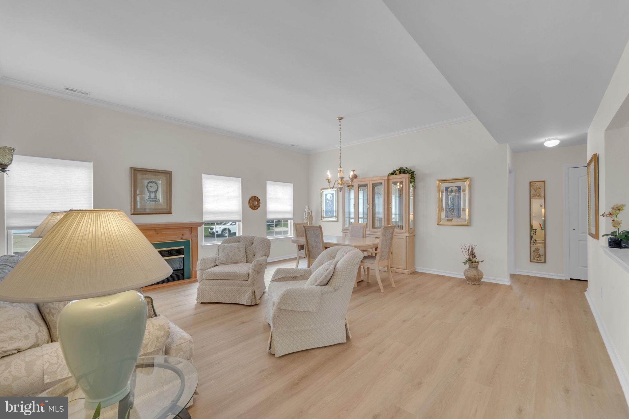 801 Freeport Way Williamstown, NJ 08094 - Photo 11 of 29 a living room with furniture and a wooden floor