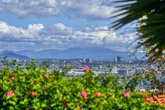 a view of a patio with chairs and table