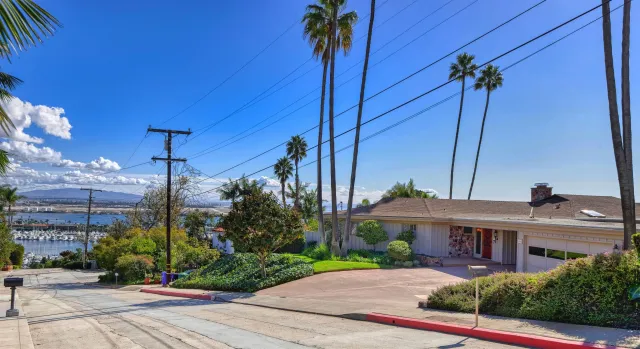 a view of a house with a street