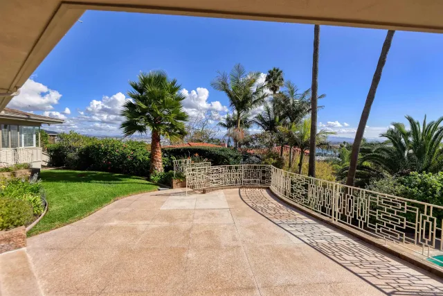 a view of a building with a tree