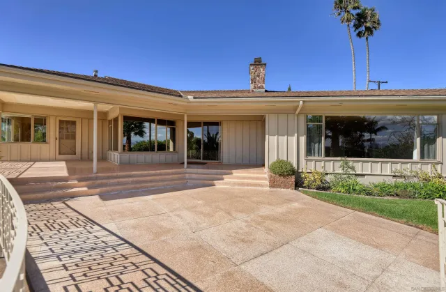 a view of a backyard with a garden