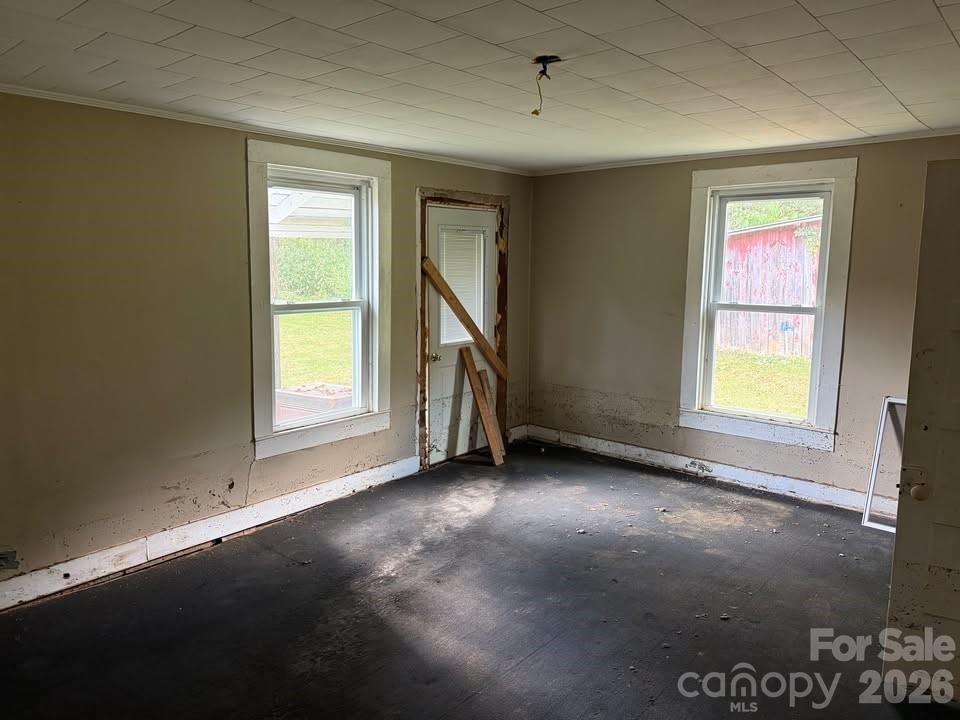 166 Old Helton School Road Lansing, NC 28643 - Photo 12 of 24 a view of an empty room with a window