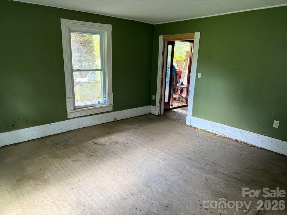 166 Old Helton School Road Lansing, NC 28643 - Photo 21 of 24 an empty room with windows