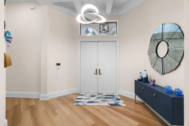 a view of a hallway with washer and dryer