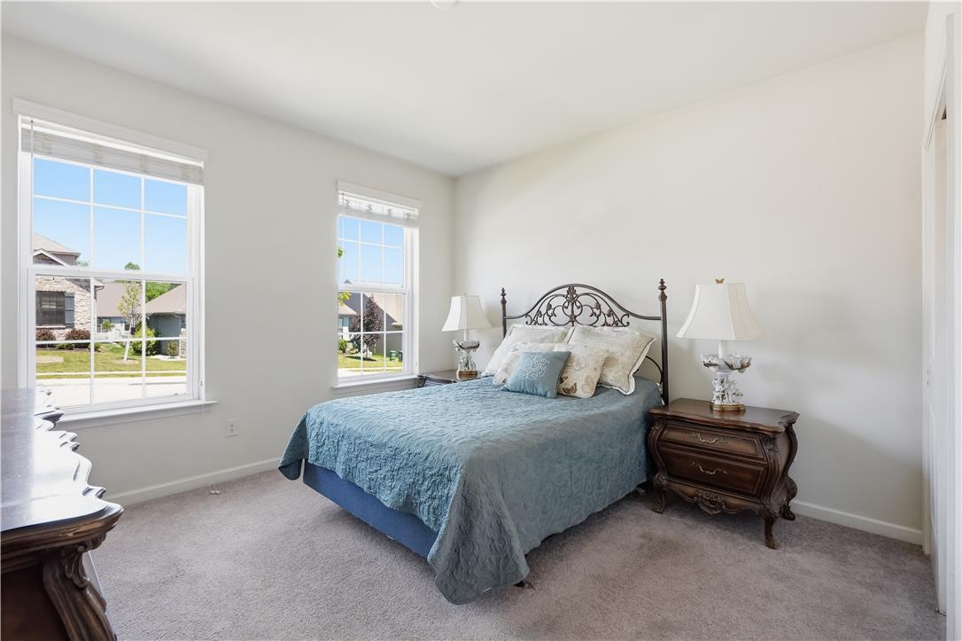 4120 Eveningstar Road Emmaus, PA 18049 - Photo 31 of 62 A well-lit bedroom with soft carpet flooring and generous natural light.