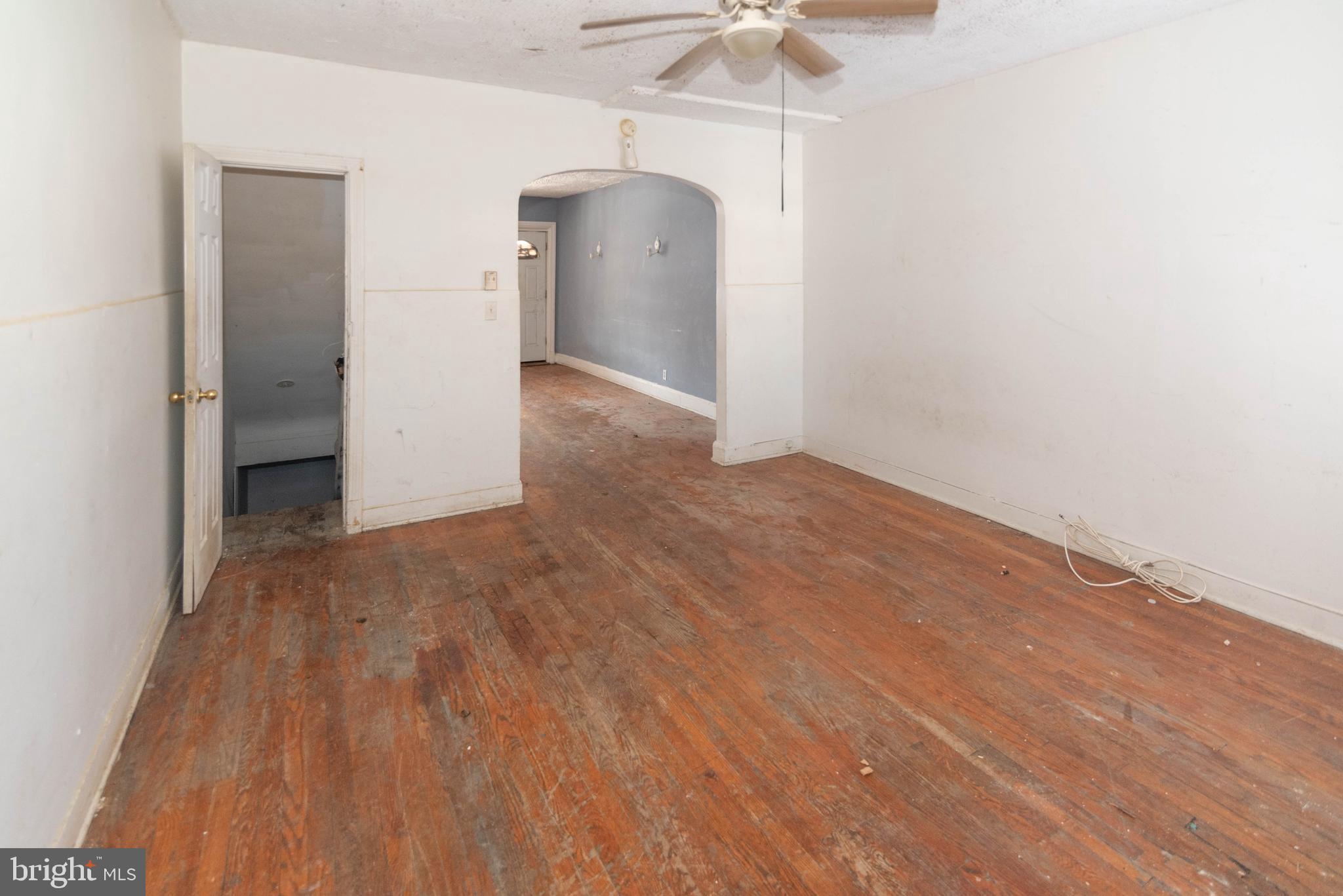 3706 Cranston Avenue Baltimore, MD 21229 - Photo 5 of 29 a view of a livingroom with wooden floor