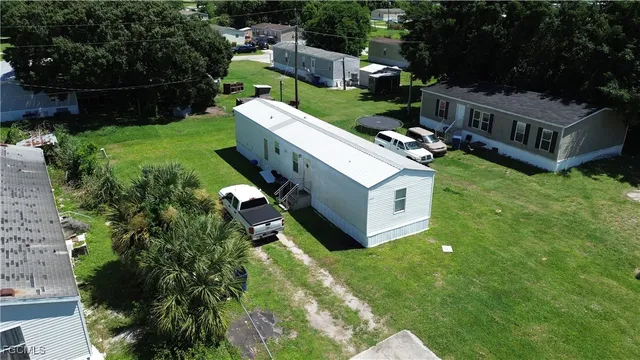 an aerial view of a house with a garden