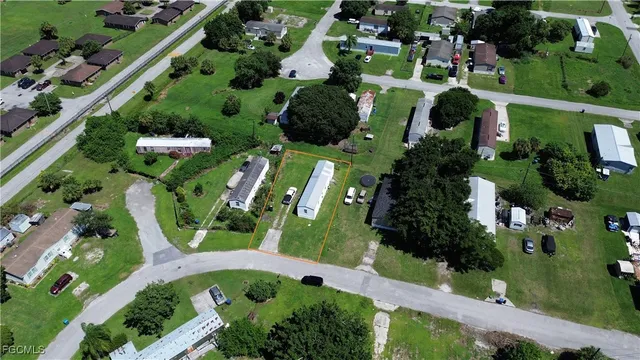 an aerial view of a large garden with lots of residential buildings