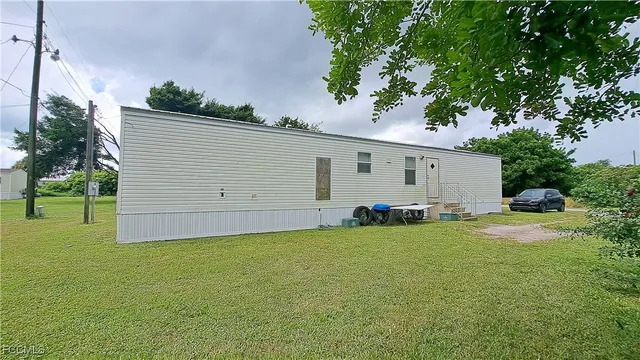 a view of a backyard with a garden