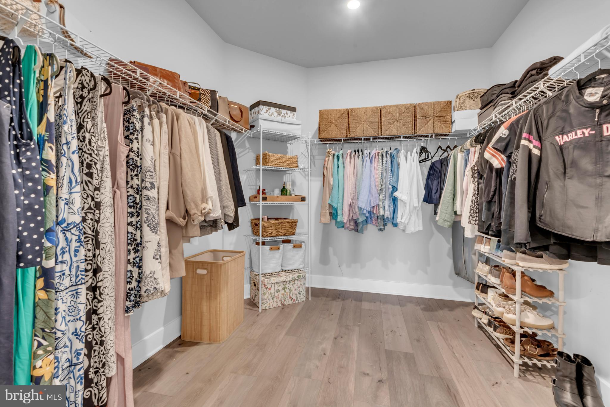 111 Marshgrass Way, Unit 21 Chester, MD 21619 - Photo 27 of 57 a view of walk in closet with clothes and shoes