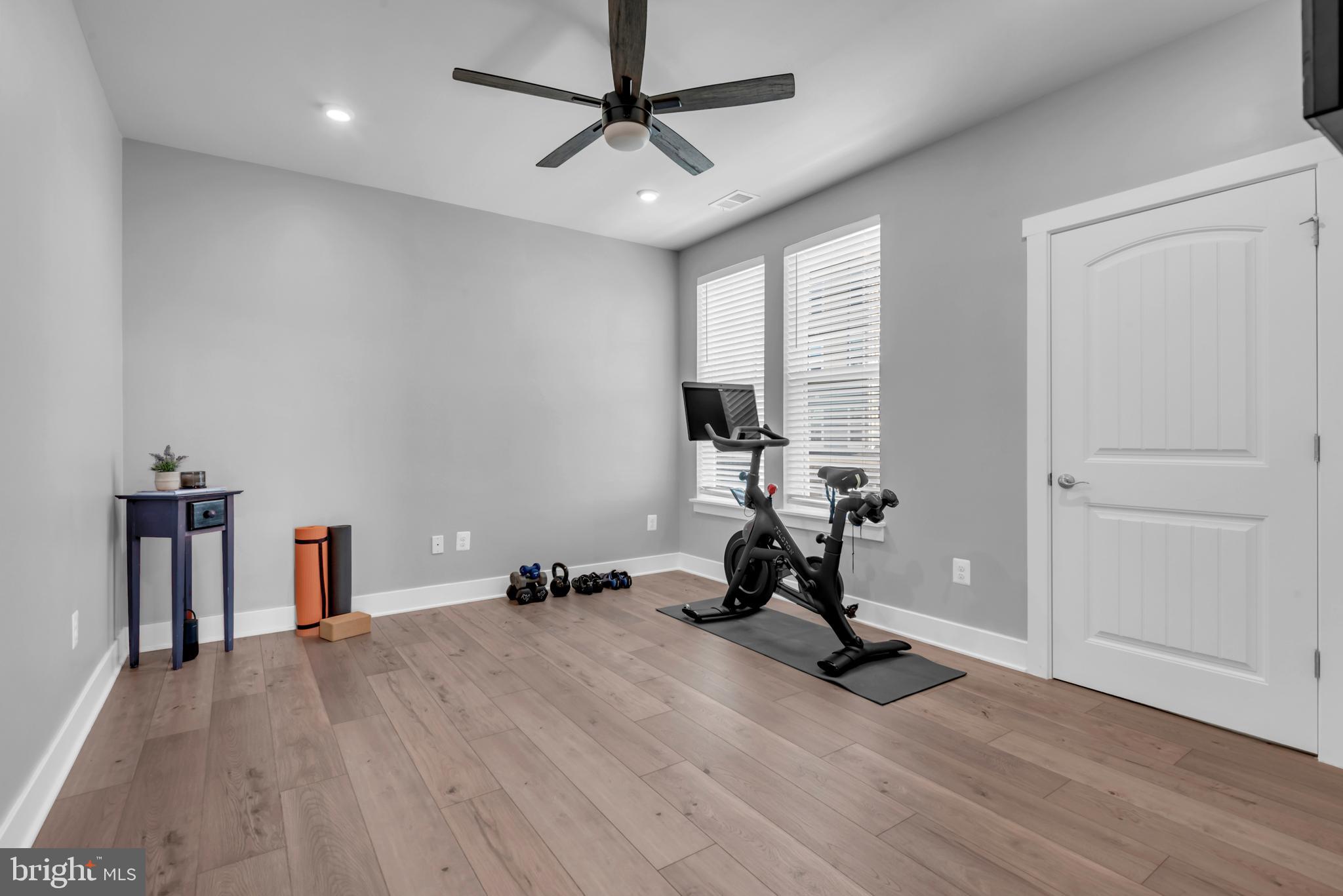 111 Marshgrass Way, Unit 21 Chester, MD 21619 - Photo 30 of 57 a view of a room with gym equipment