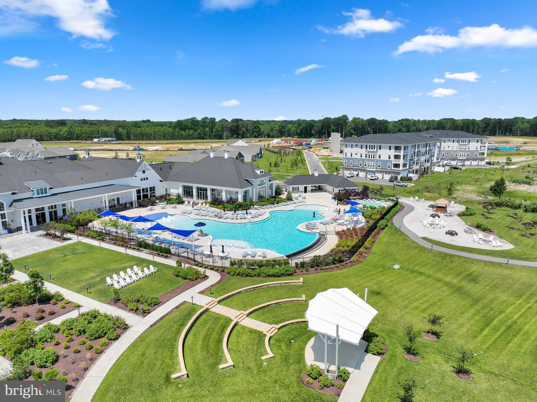 111 Marshgrass Way, Unit 21 Chester, MD 21619 - Photo 54 of 57 a view of a swimming pool and outdoor space