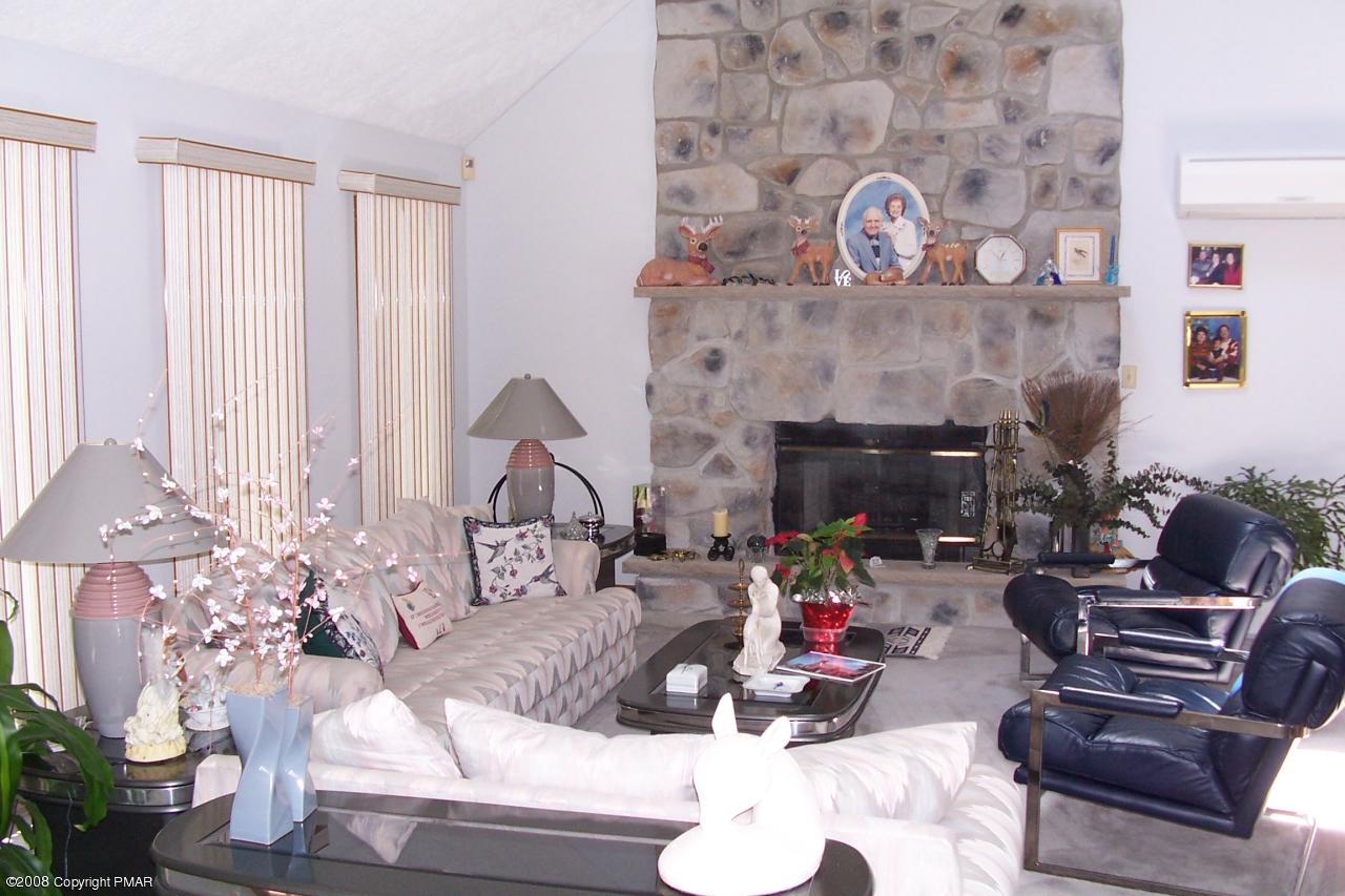 1272 Pebble Beach Road Tobyhanna, PA 18466 - Photo 5 of 8 living room/stone fireplace