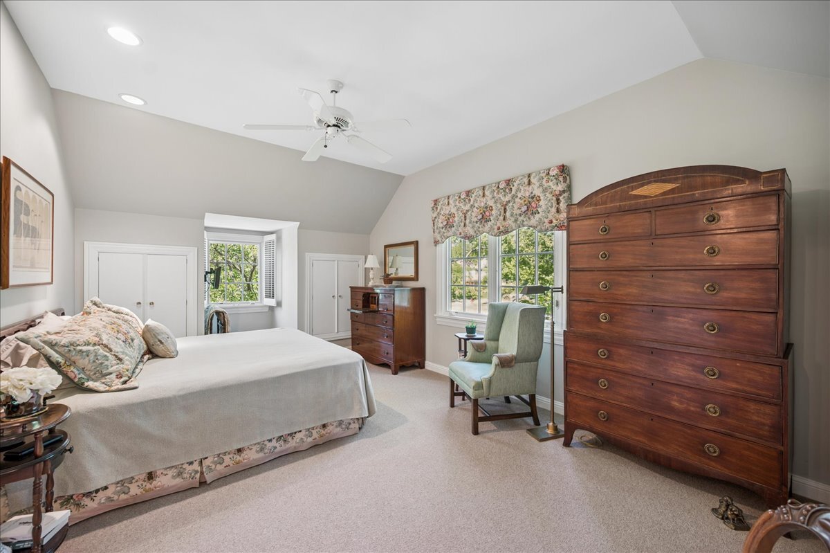 253 Summerfield Road Northbrook, IL 60062 - Photo 26 of 46 a bedroom with a bed and a dresser