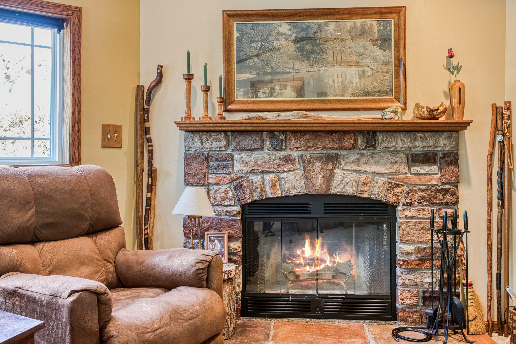 335 Charley Bowser Road Accident, MD 21520 - Photo 27 of 85 Beautiful stone fireplace warms the room.
