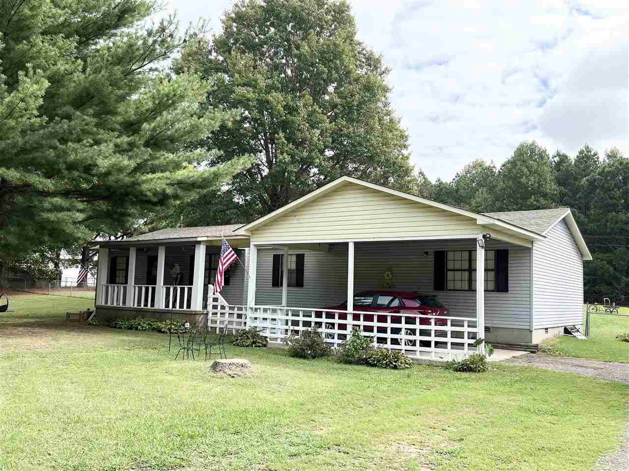 62 Rabbit Trail Road Ripley, TN 38063 - Photo 5 of 11 a front view of a house with a yard