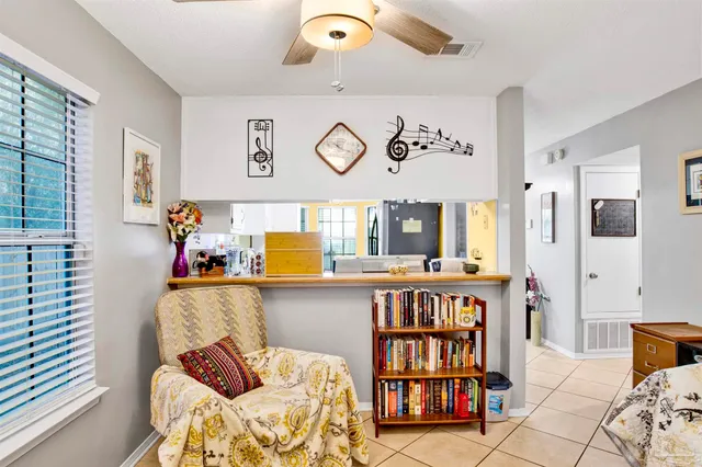 a view of a furniture and window in a room