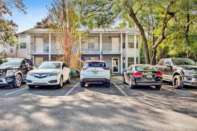 a car parked in front of a house