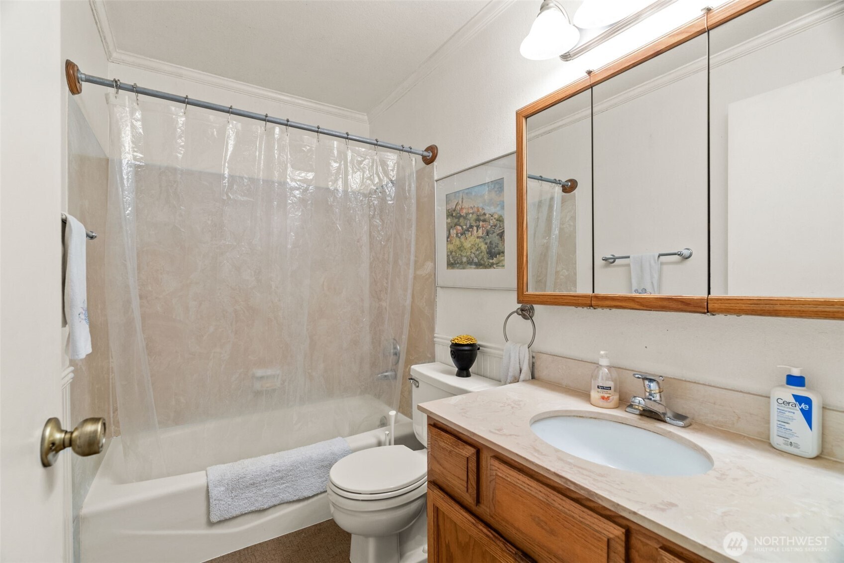 8517 242nd Street Southwest, Unit 402B Edmonds, WA 98026 - Photo 18 of 23 a bathroom with a granite countertop sink toilet mirror and shower