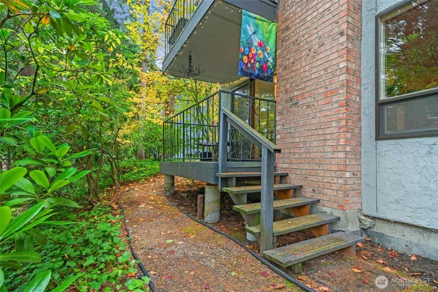 a view of a house with a tree
