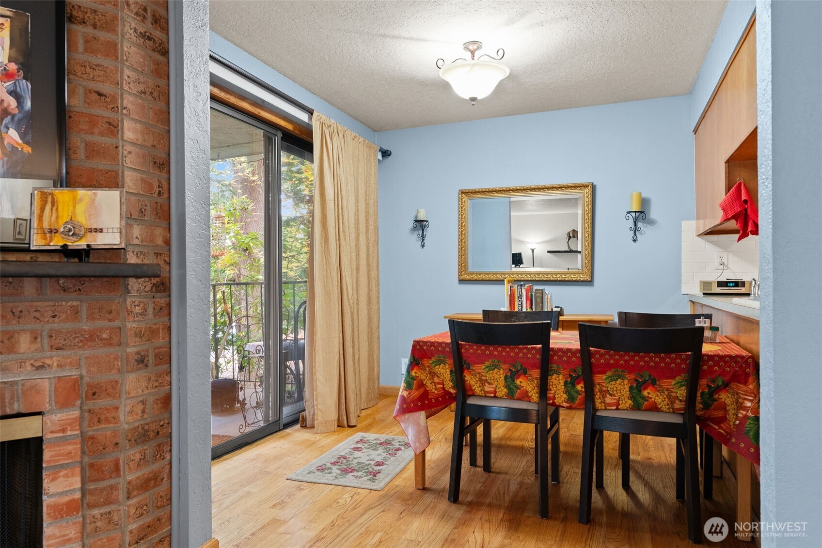 8517 242nd Street Southwest, Unit 402B Edmonds, WA 98026 - Photo 9 of 23 a view of a dining room with furniture window and outside view
