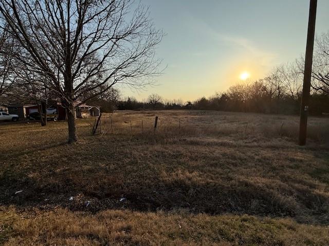 Tbd Airport Road Reno, TX 75462 - Photo 2 of 3 a view of outdoor space with green field and trees