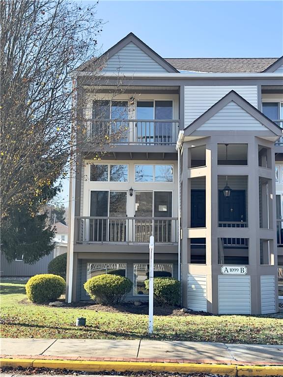 1099 Riverside Drive, Unit A Beaver, PA 15009 - Photo 1 of 49 a front view of a house with a yard
