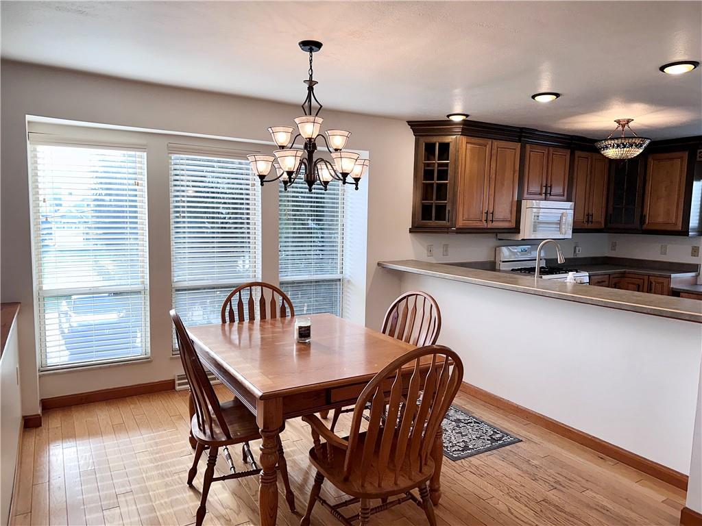 1099 Riverside Drive, Unit A Beaver, PA 15009 - Photo 12 of 49 a view of a dining room with furniture window and outside view