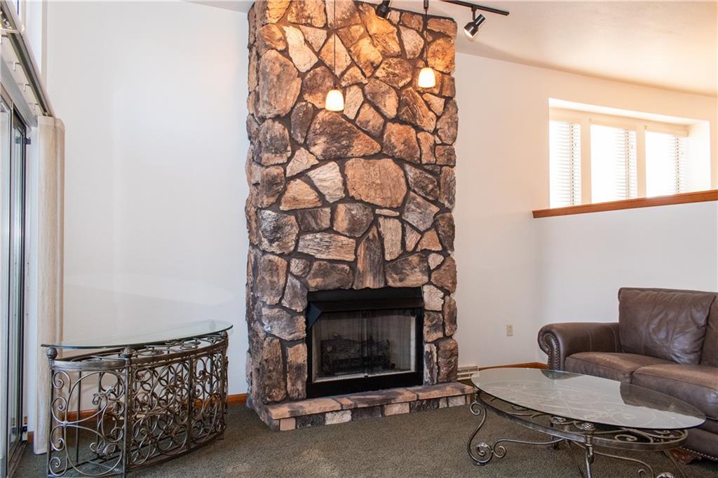 1099 Riverside Drive, Unit A Beaver, PA 15009 - Photo 16 of 49 a living room with a fireplace