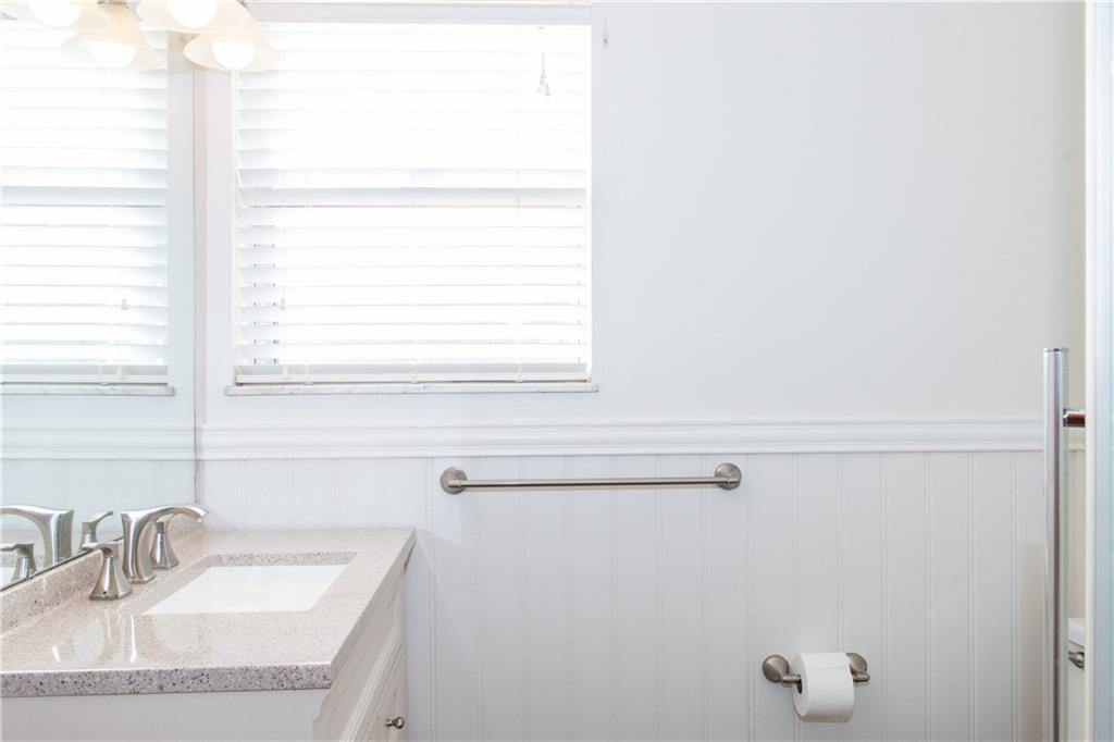 1099 Riverside Drive, Unit A Beaver, PA 15009 - Photo 25 of 49 a bathroom with a sink and a window