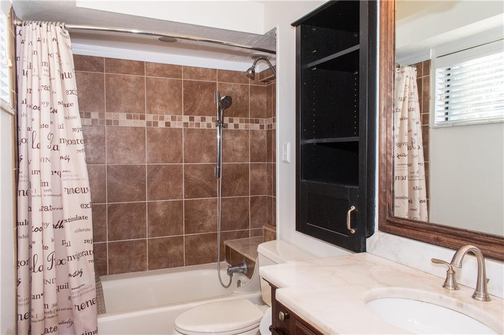 1099 Riverside Drive, Unit A Beaver, PA 15009 - Photo 36 of 49 a bathroom with a sink toilet and shower