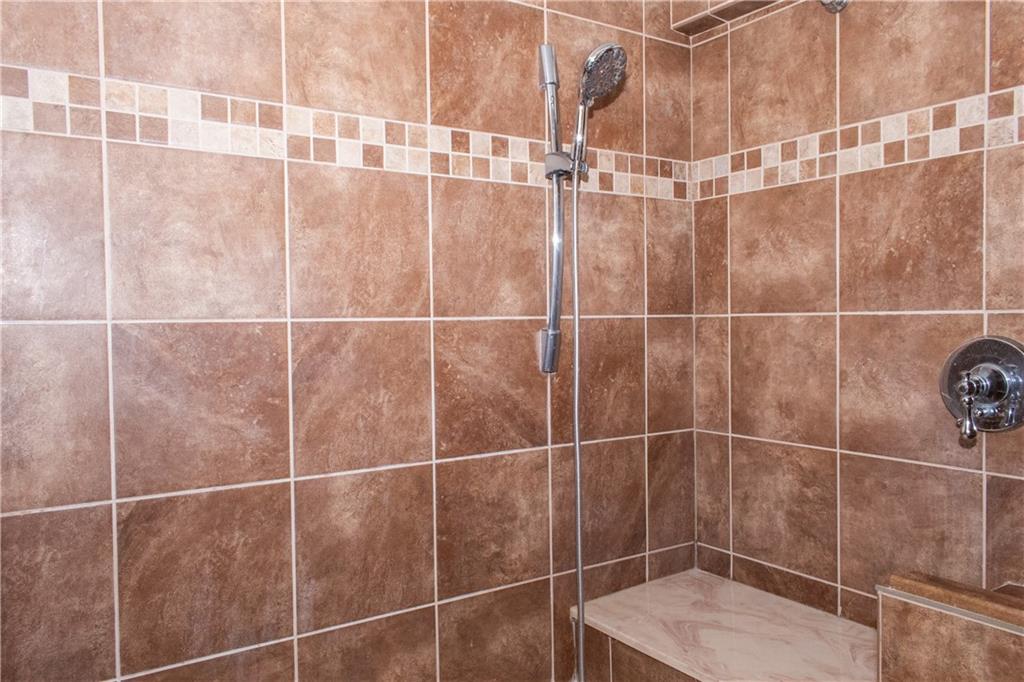 1099 Riverside Drive, Unit A Beaver, PA 15009 - Photo 37 of 49 a bathroom with a shower