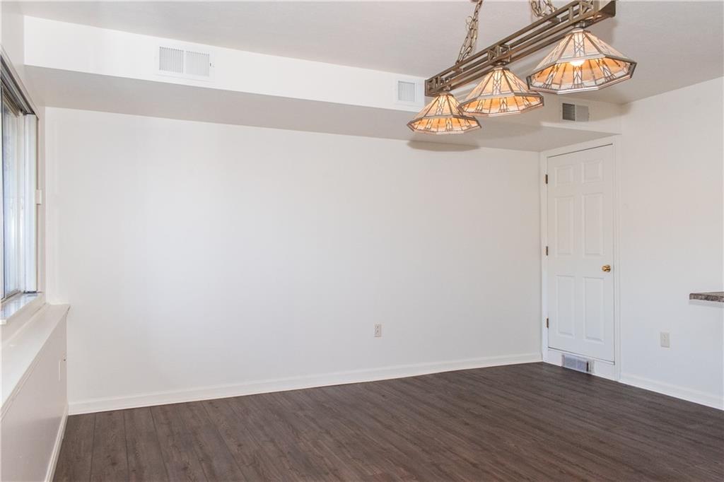 1099 Riverside Drive, Unit A Beaver, PA 15009 - Photo 41 of 49 a view of an entryway with wooden floor