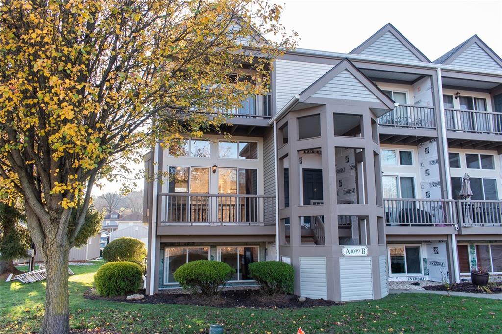 1099 Riverside Drive, Unit A Beaver, PA 15009 - Photo 46 of 49 a front view of a residential apartment building with a yard