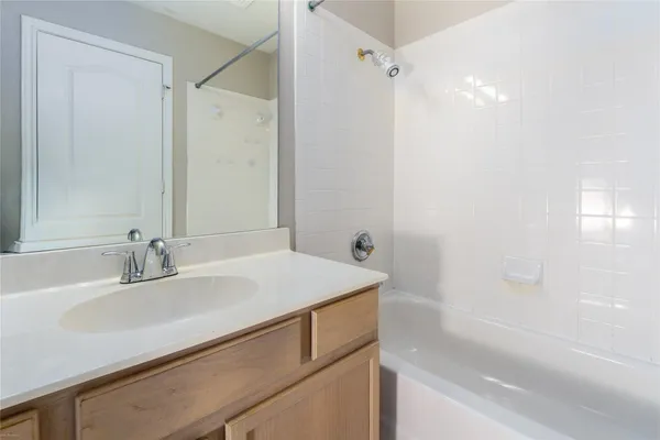 a bathroom with a sink and a bathtub