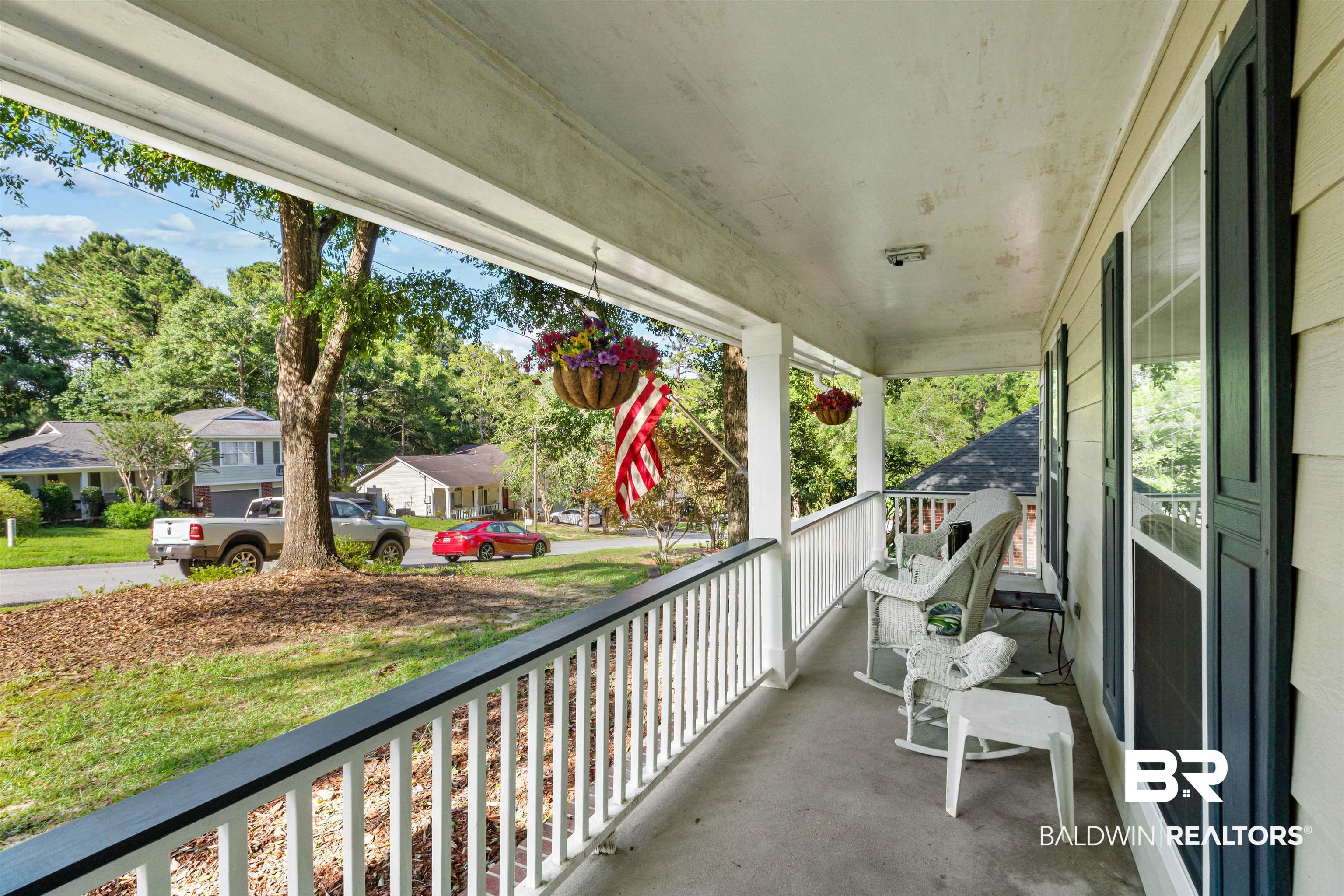 153 Lakeview Loop Daphne, AL 36526 - Photo 9 of 56 Start your mornings with coffee on the front porch and unwind in the evenings while enjoying the neighborhood atmosphere.
