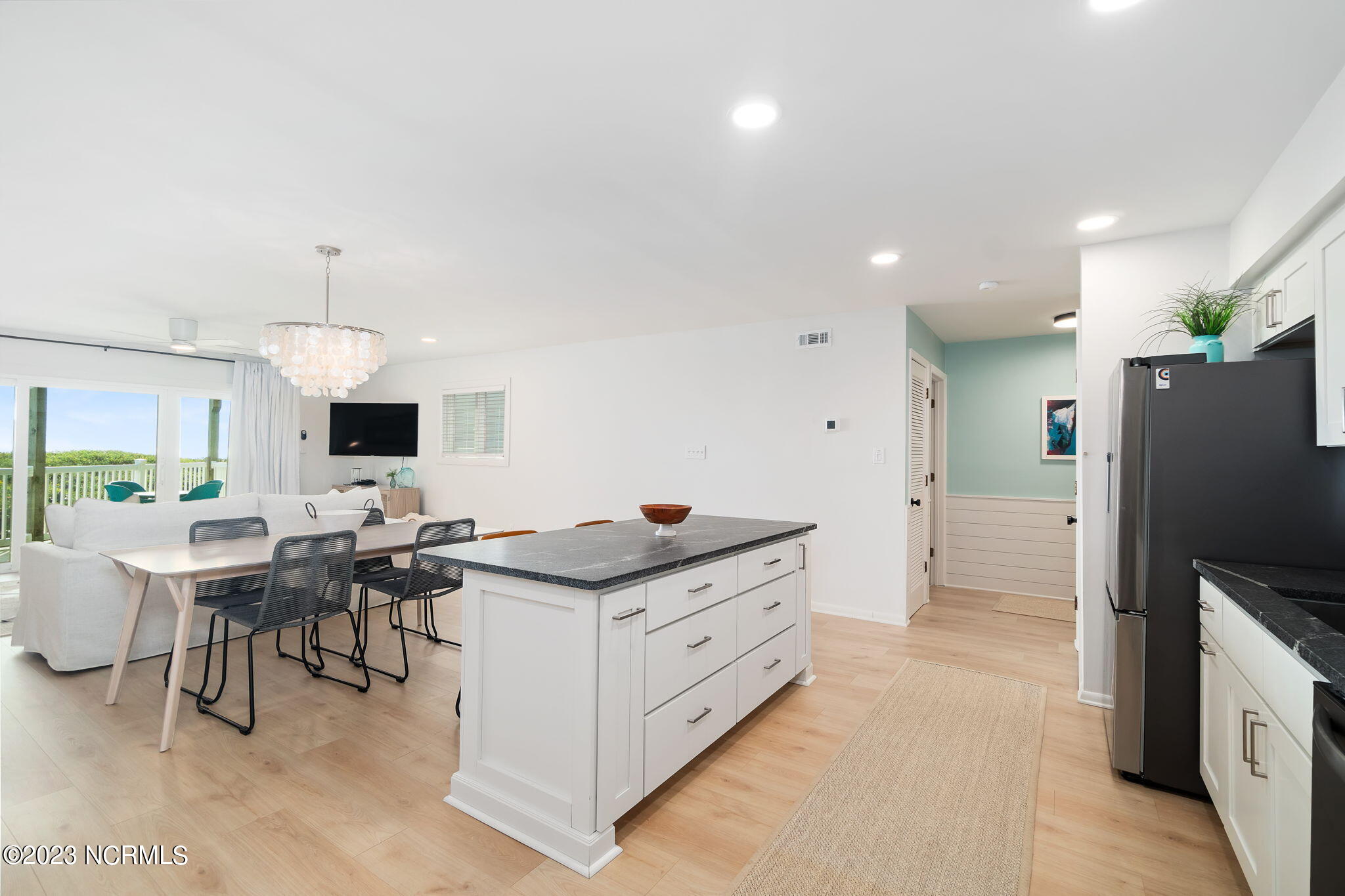 855 Salter Path Road, Unit 121 Indian Beach, NC 28512 - Photo 15 of 46 Kitchen w/ island seating
