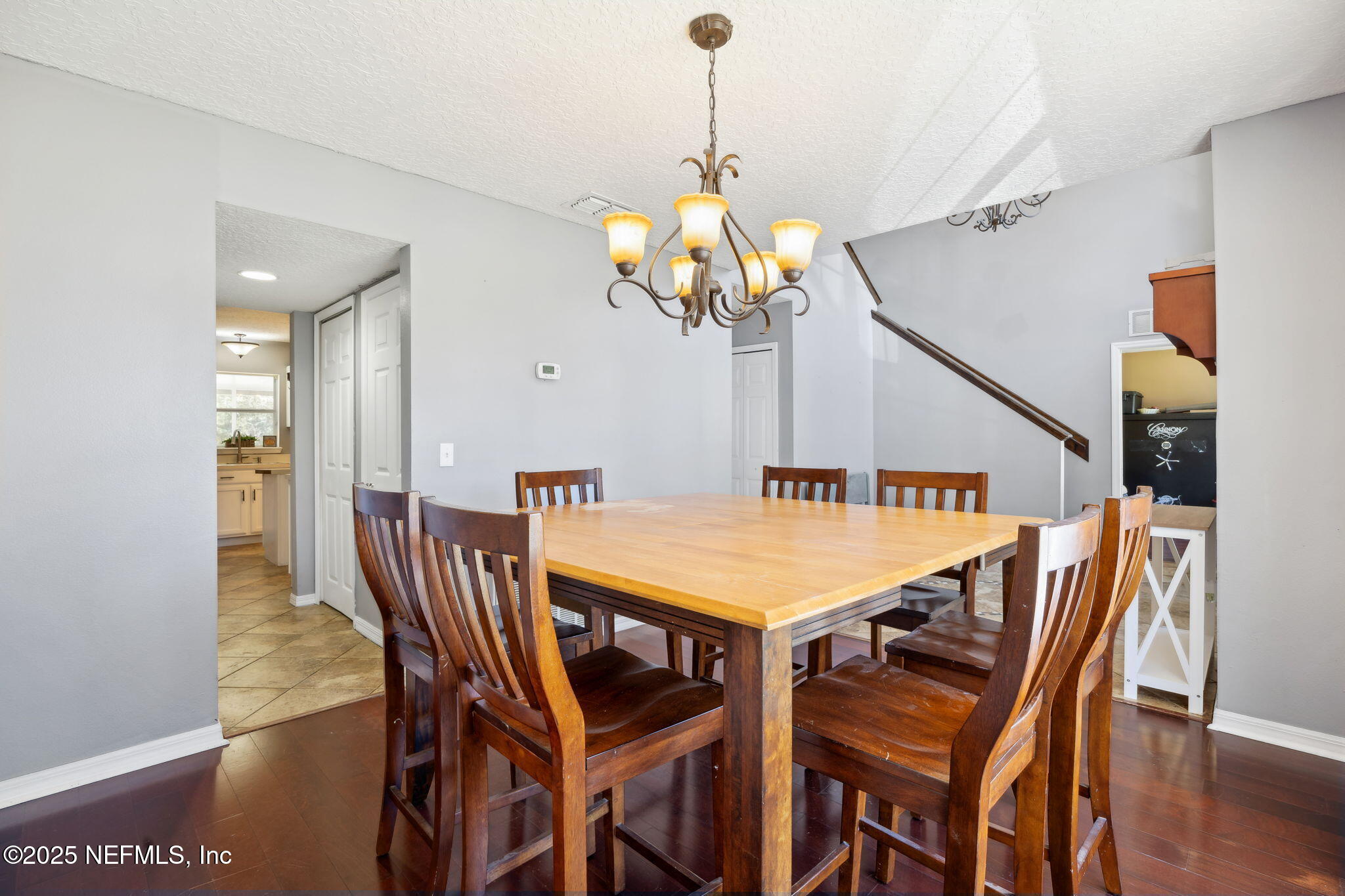 87002 Kip Lane Yulee, FL 32097 - Photo 19 of 54 a dining room with furniture and window