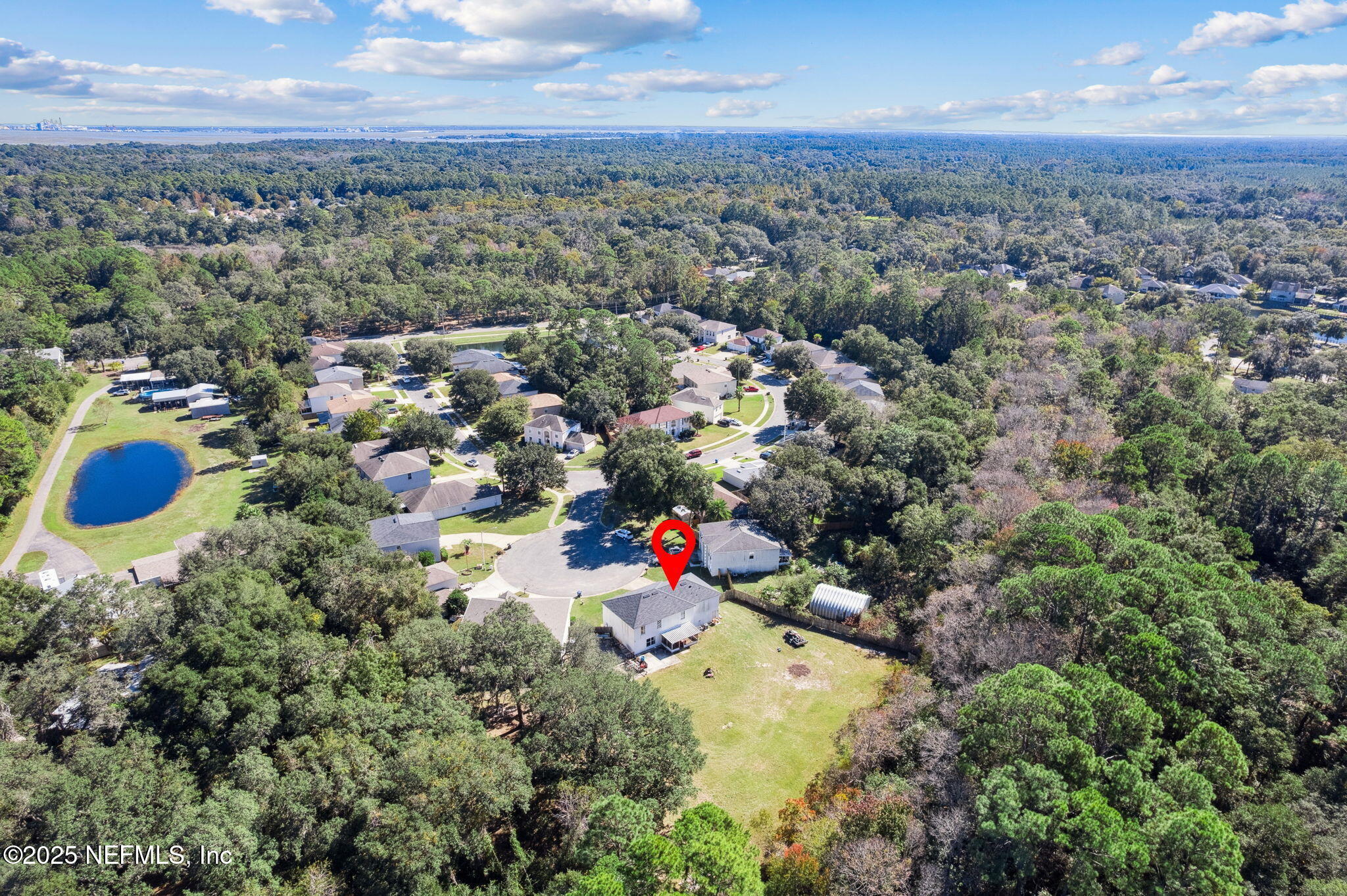 87002 Kip Lane Yulee, FL 32097 - Photo 49 of 54 an aerial view of multiple house
