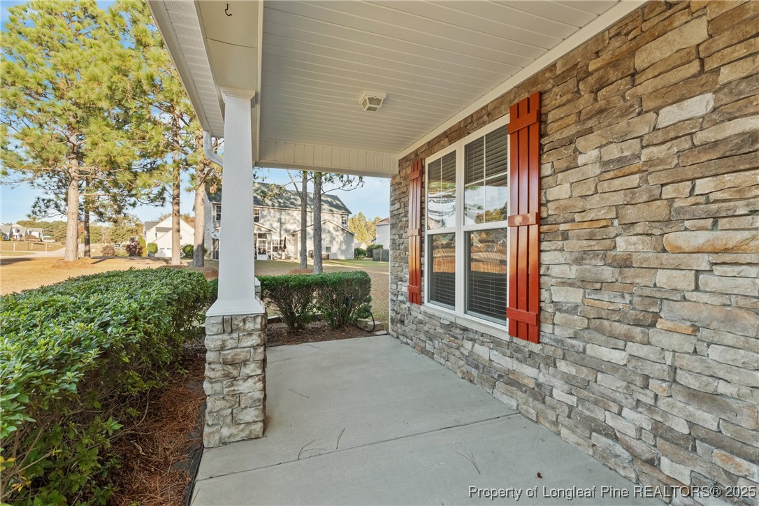 305 Home Stretch Lane Raeford, NC 28376 - Photo 6 of 35 a front view of a house with a yard