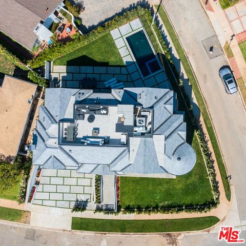 a view of a big yard with an outdoor space