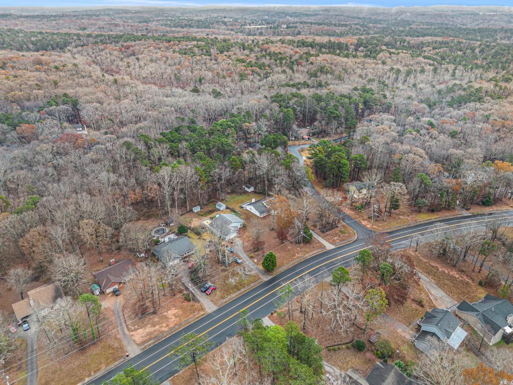 5524 Dorsett Shoals Road Douglasville, GA 30135 - Photo 29 of 33 a view of a yard with wooden fence