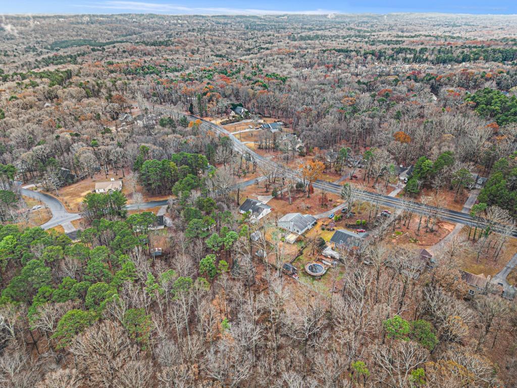 5524 Dorsett Shoals Road Douglasville, GA 30135 - Photo 30 of 33 an aerial view of residential houses with outdoor space