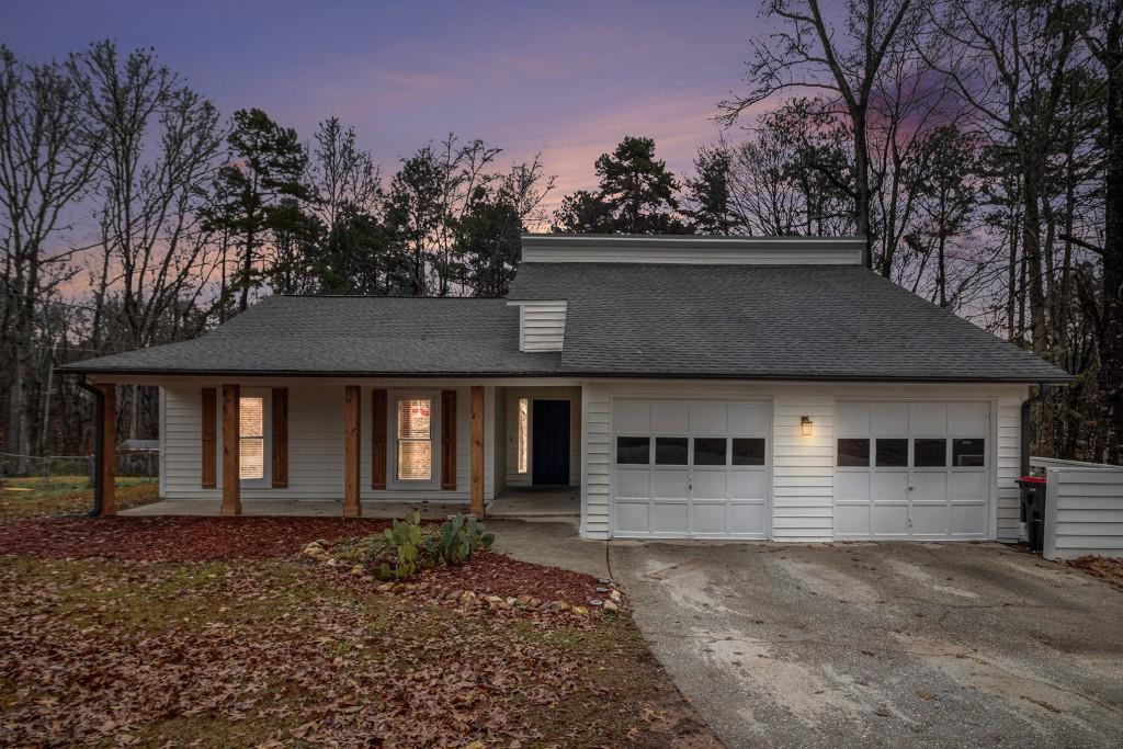 5524 Dorsett Shoals Road Douglasville, GA 30135 - Photo 31 of 33 a front view of a house with garden