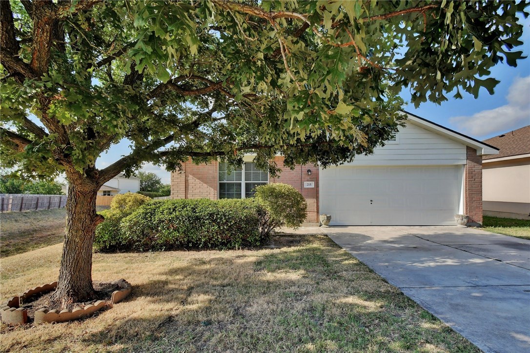 215 Rinehardt Street Hutto, TX 78634 - Photo 1 of 1 Your new home is tucked away on a quiet street in Hutto!