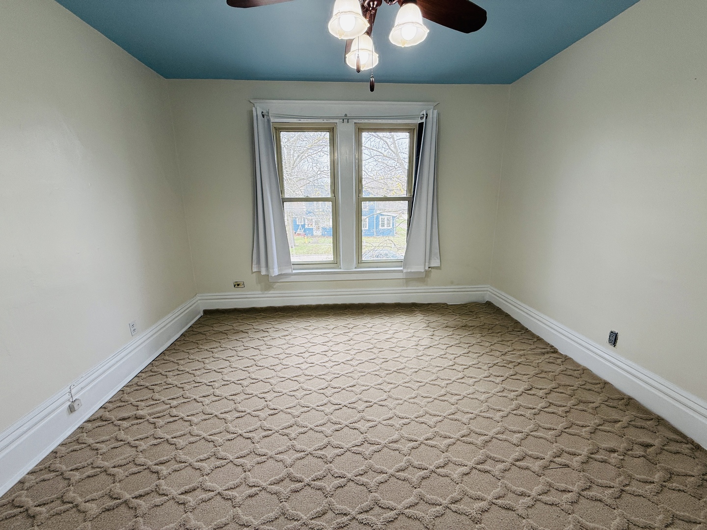 312 North Chicago Street Dwight, IL 60420 - Photo 12 of 16 an empty room with wooden floor chandelier and windows