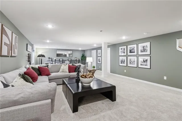 a living room with furniture and window