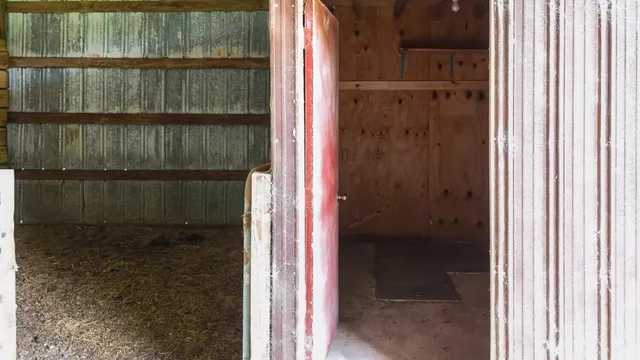 a view of a door and wooden floor